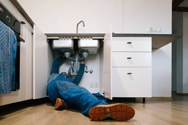 Professional Emergency Plumber technician working in Means, KY